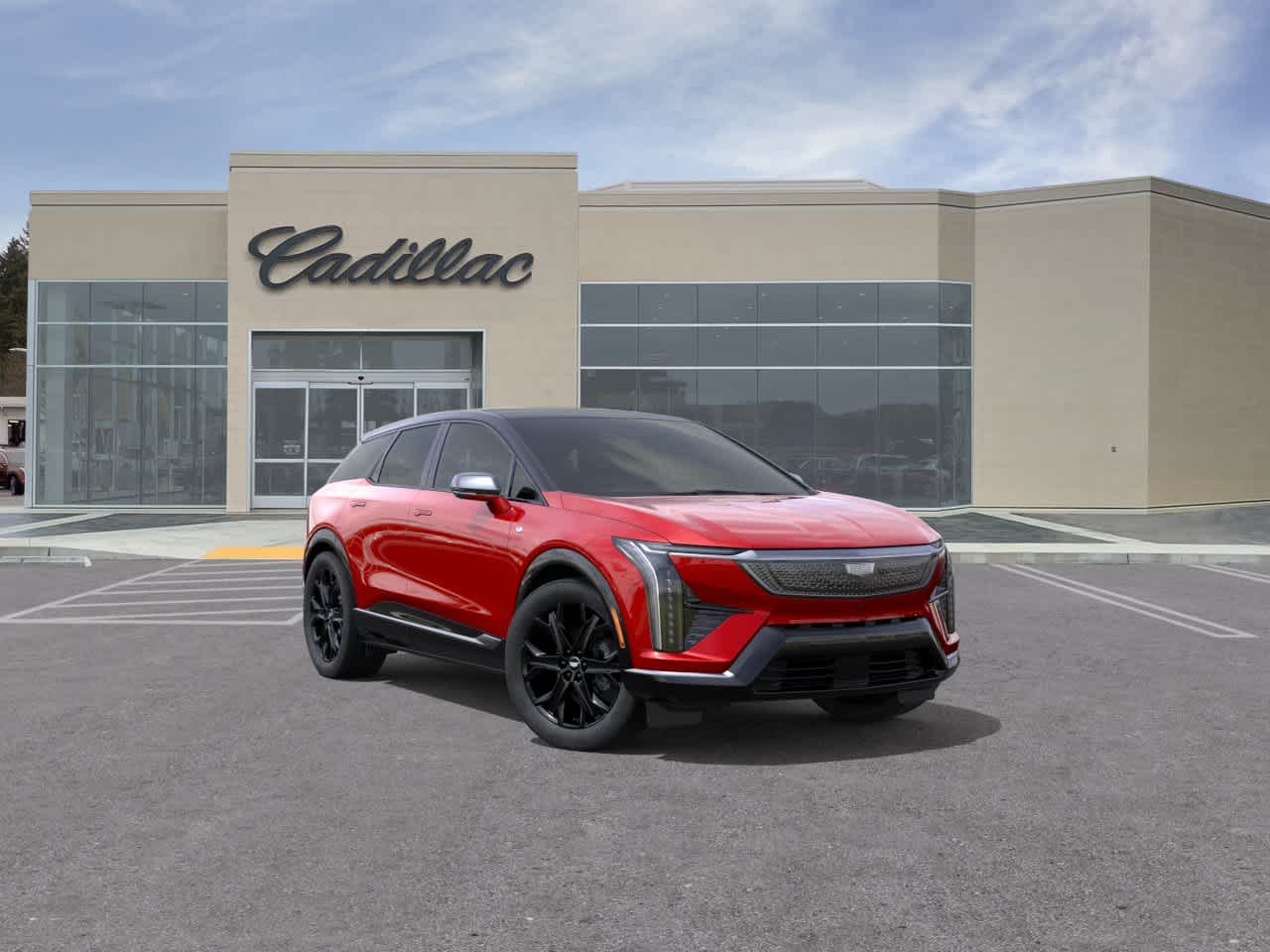 2026 Cadillac OPTIQ Premium Sport in Radiant Red Tintcoat — front three-quarter view
